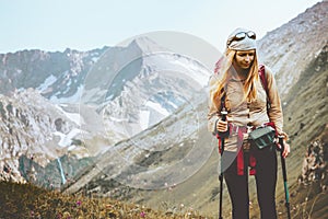 Woman hiking at rocky mountains