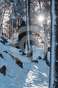 Woman hiking in the snow