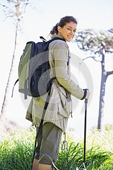 Woman with hiking sticks