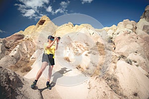 Woman on hill in Cappadocia, Turkey