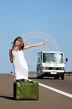 Woman hitchhiking
