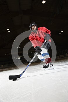 Woman hockey player.