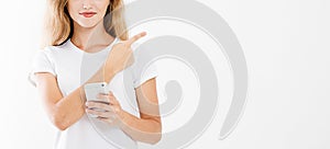 woman hold blank screen cellphone, pointing finger isolated on white background, hand holding black phone, copy space