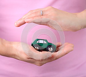 Woman hold car