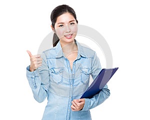 Woman hold with clipboard and thumb up