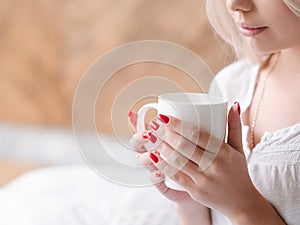 Woman hold cup drink sensual comfy home leisure