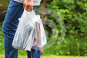 Holding Plastic Bags photo