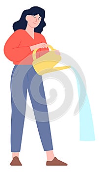 Woman hold watering can with pouring water. Gardening person