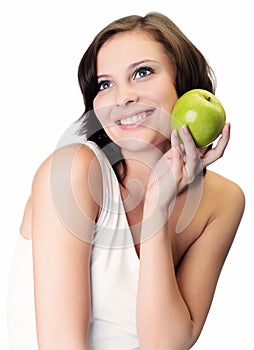 Woman holding apple against white