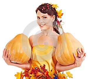 Woman holding autumn pumkin. photo