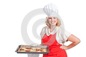 Woman holding a bake sheet