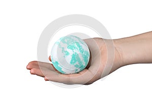 Woman holding bath bomb on white background, closeup