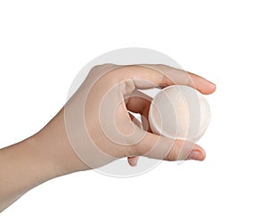 Woman holding bath bomb on white background, closeup