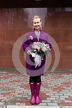 Woman holding beautiful bouquet of flowers photo