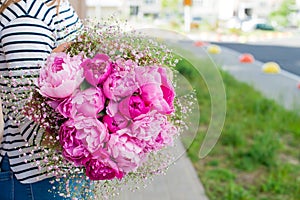 woman with bouquet of flowers