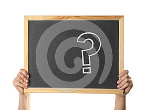 Woman holding blackboard with question mark on background, closeup