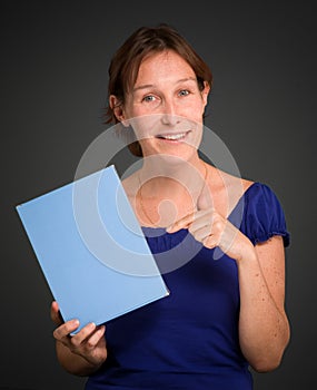 Woman holding blank box