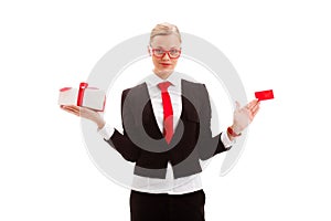 Woman holding blank businesscard and giftbox