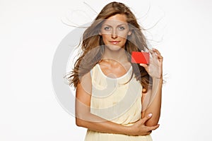 Woman holding blank credit card
