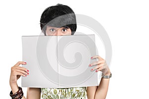 Woman holding blank magazine