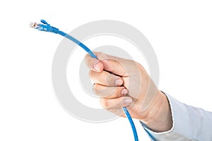 Woman holding blue LAN cord in hand isolated on white background. Networking concept.