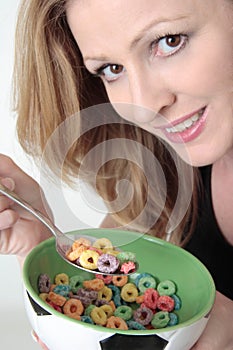 Woman holding bowl of cereal