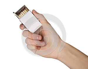 Woman holding box with matches on white background, closeup.