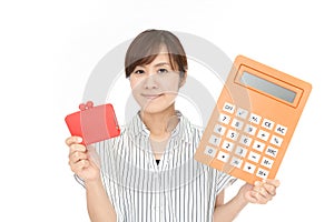 Woman holding a calculator