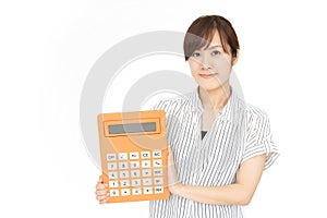 Woman holding a calculator