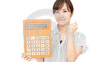 Woman holding a calculator