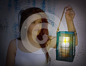 Woman Holding Candle Light in Evening