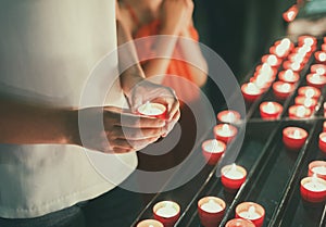 Woman holding candle. photo