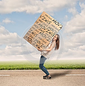 Woman holding a cardbox