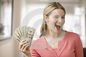 Woman Holding Cash