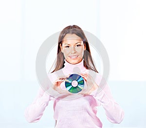 Woman holding cd disk