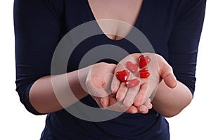 Woman holding ceramic hearts