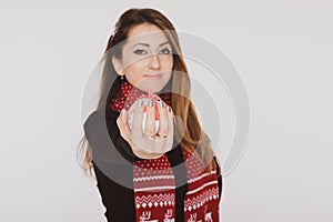 Woman holding Christmas ball