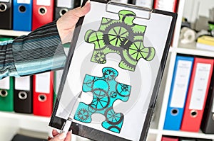 Teamwork concept on a clipboard