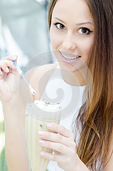 Woman holding cocktail