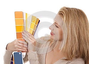 Woman holding color chart