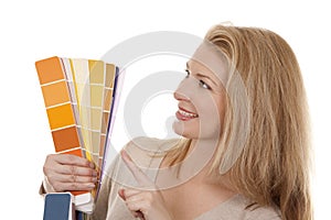 Woman holding color chart