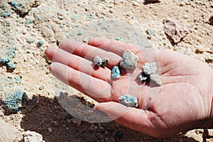 Woman holding copper mineral in  Timna Valley Park Eilat Israel