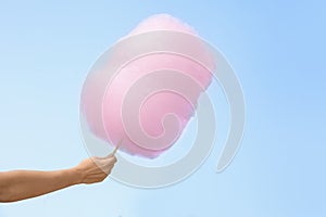 Woman holding cotton candy