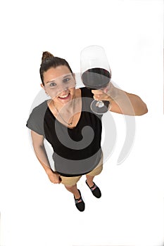 A woman holding a coup of white wine on white