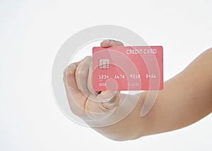 Woman holding credit card on white background