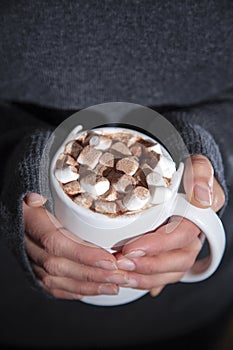 Woman holding a cup of hot chocolate