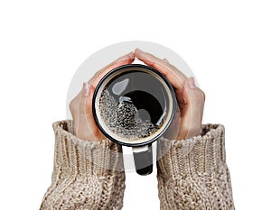 Woman holding cup of hot coffee isolated on white, closeup photo of hands in warm sweater with mug, winter morning concept, top vi