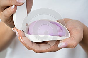 Woman Holding Diaphragm