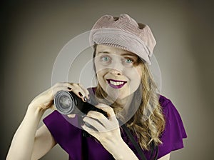 Woman holding digital camera