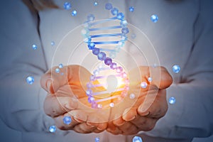 Woman holding dna helix hologram
